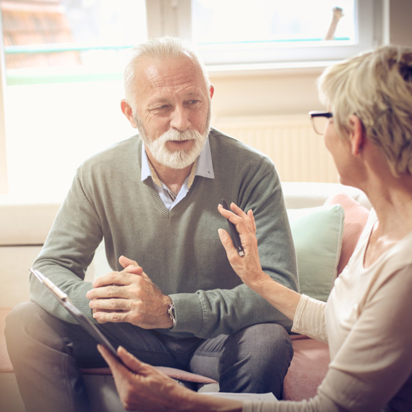 elderly couple talking